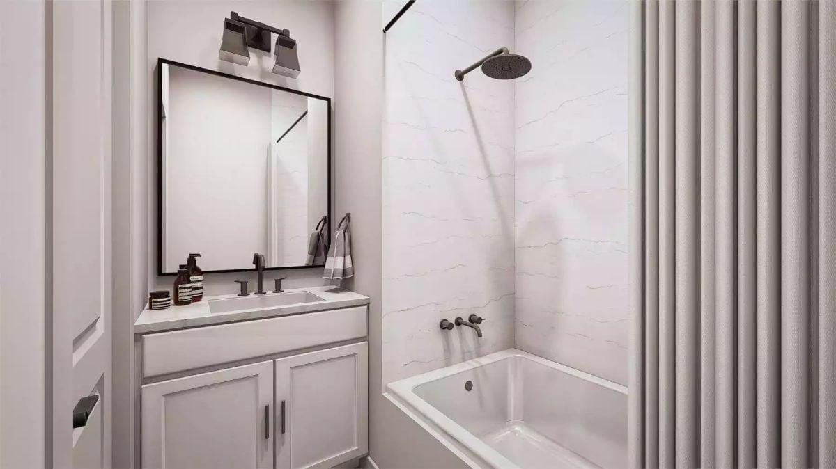 Rain Head, Wall-Mount Faucet, and a Tub That Pulls Real Weight