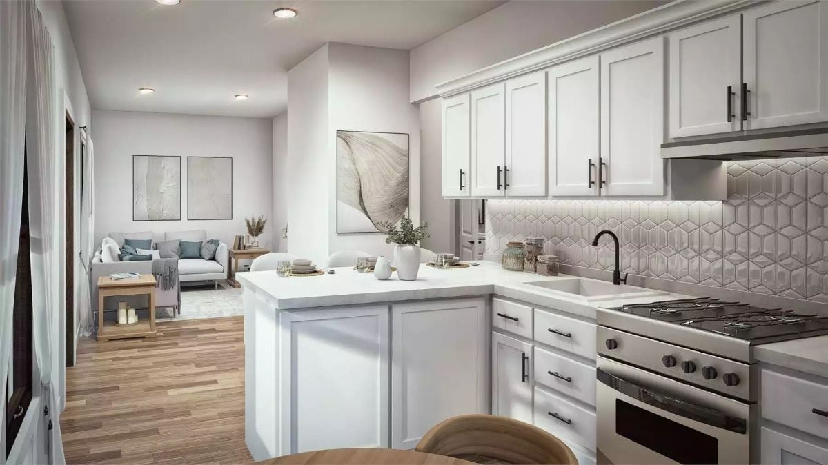 White Shaker Cabinets, Hexagon Tile, and a Kitchen That Opens Right Up