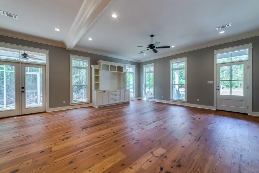 Reclaimed-Style Floors and a Built-In That's Ready for a TV or a Library