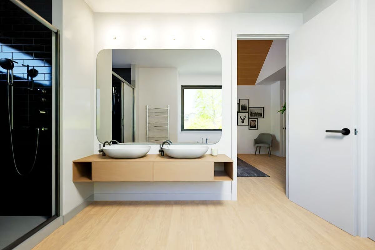 Floating Vanity, Black Fixtures, and a Shower That Means It
