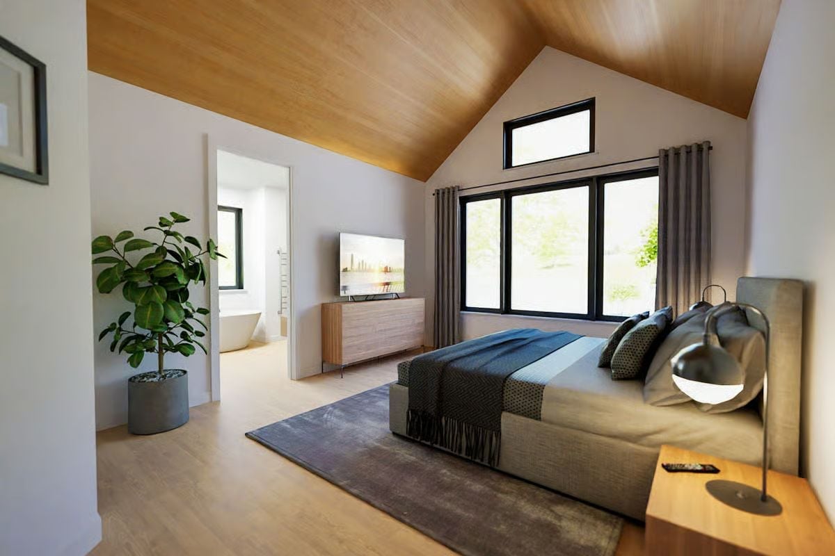 Vaulted Ceiling, Warm Wood, and a Bathtub Visible Through the Door Like a Reward