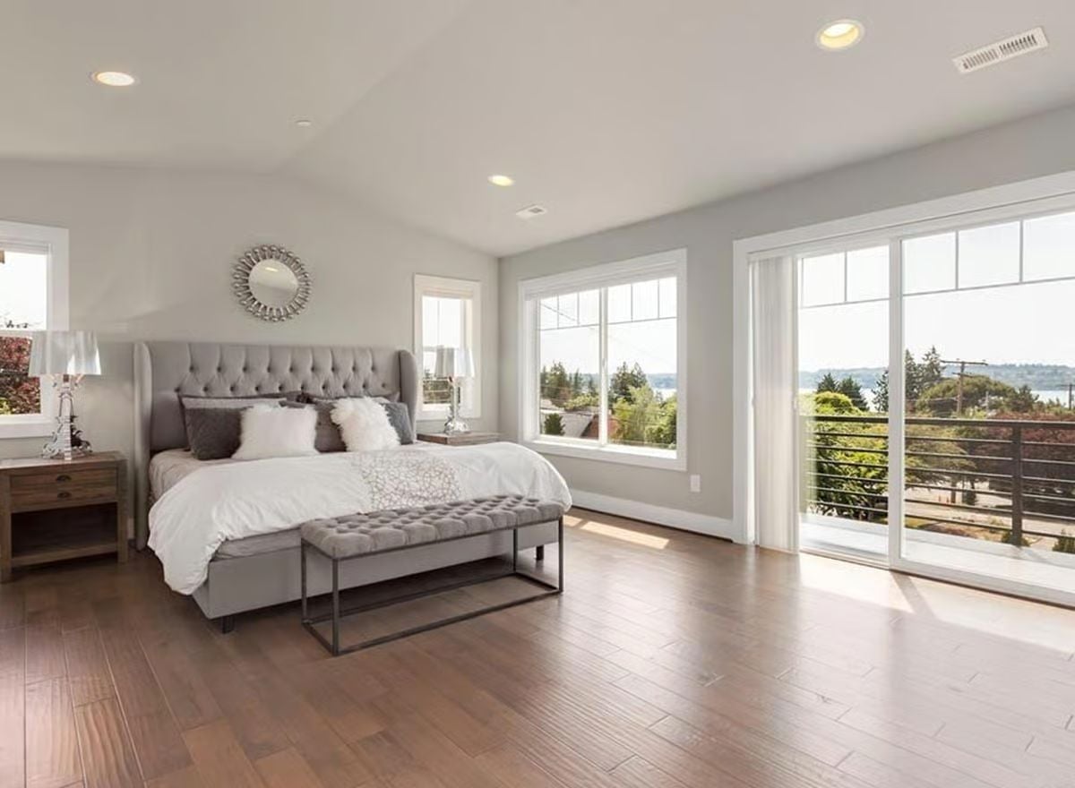 Tufted Wingback Headboard, Balcony Views, and Floors Worth Keeping