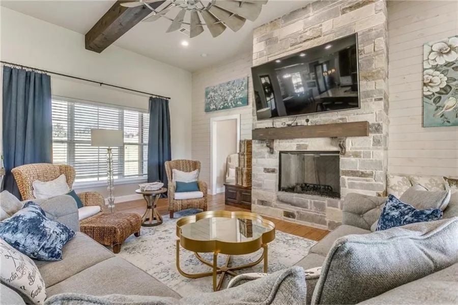 Windmill Ceiling Fan, Stone Fireplace, and Zero Apologies for Going Full Farmhouse