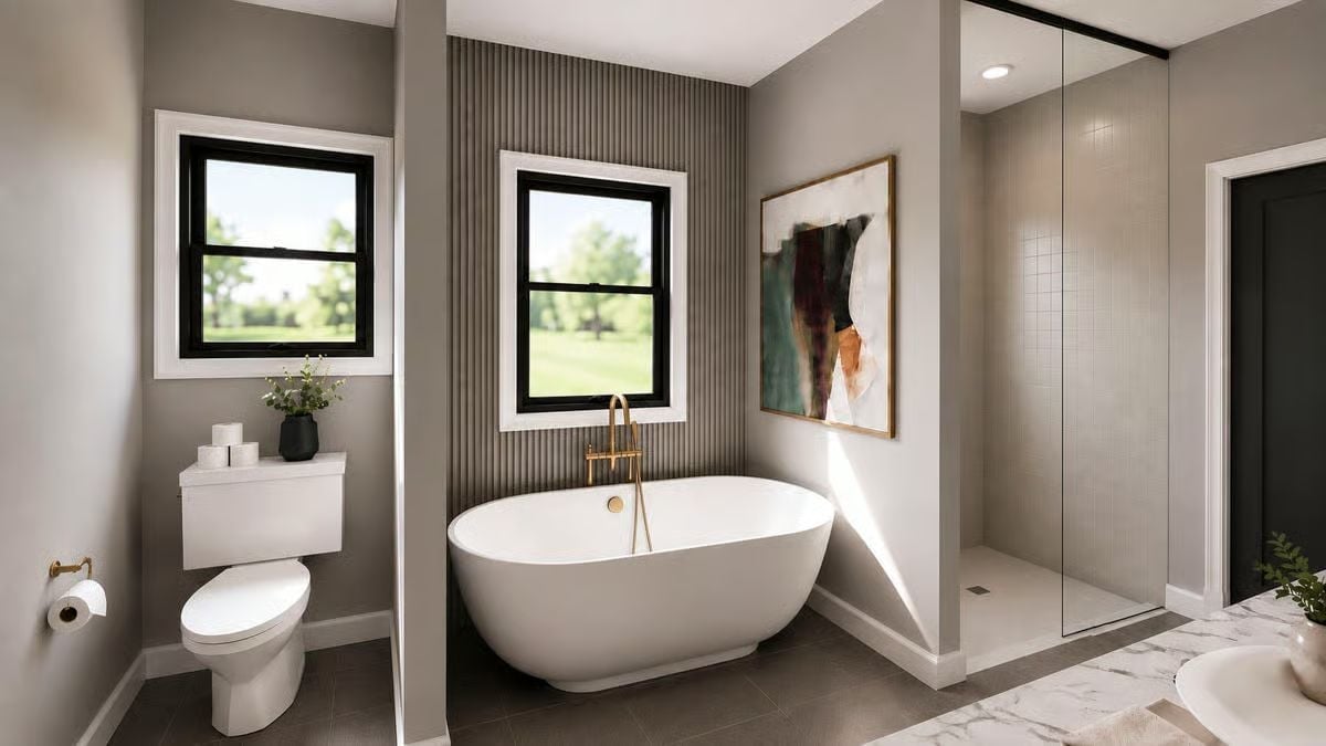 Gold Freestanding Tub Fixtures in a Room That Knows Exactly What It's Doing