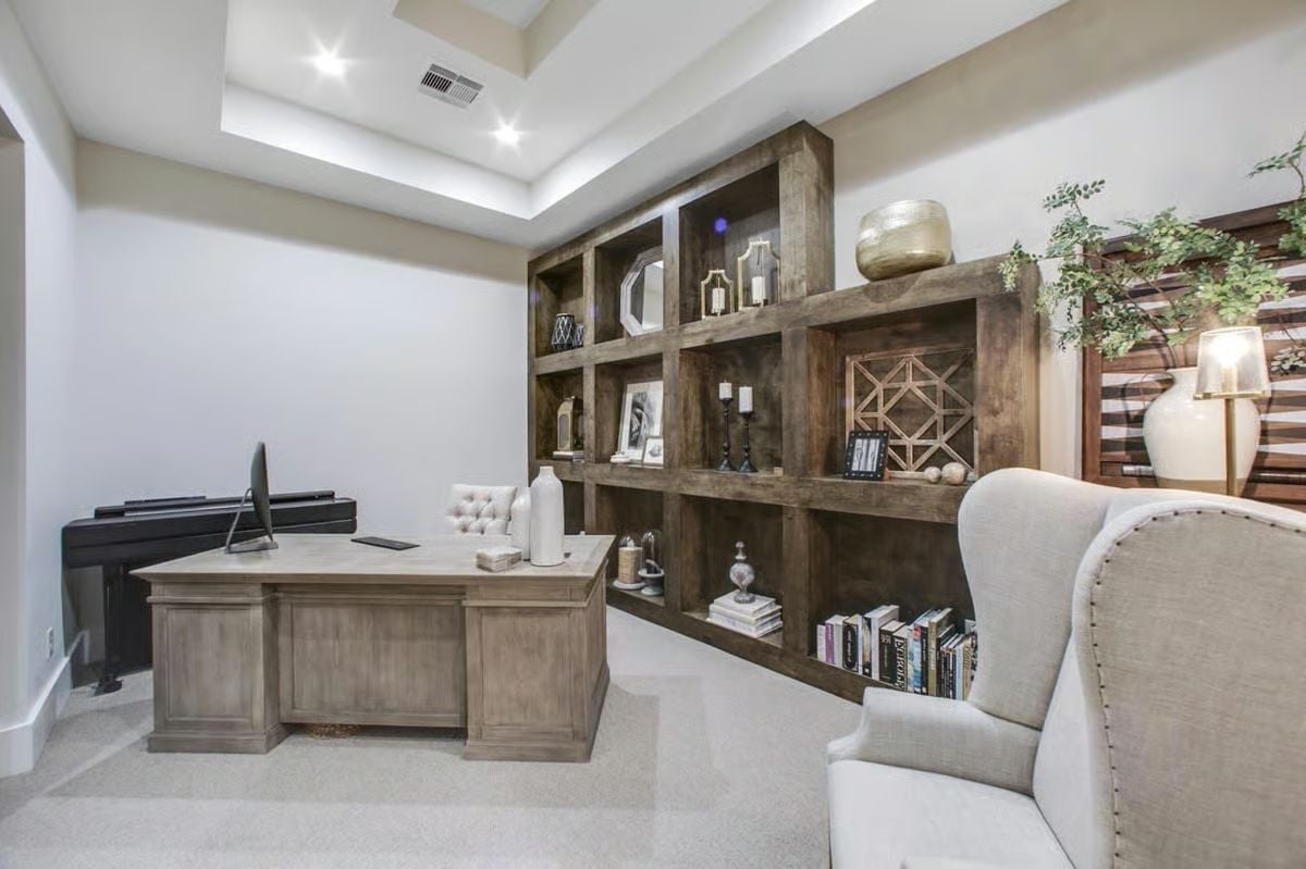 Dark Wood Shelving, Wingback Chair, and a Home Office Built for Actual Work