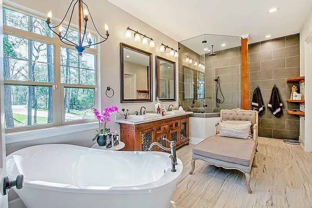 Freestanding Soaking Tub Gets the Window Wall It Deserves in This Primary Bath