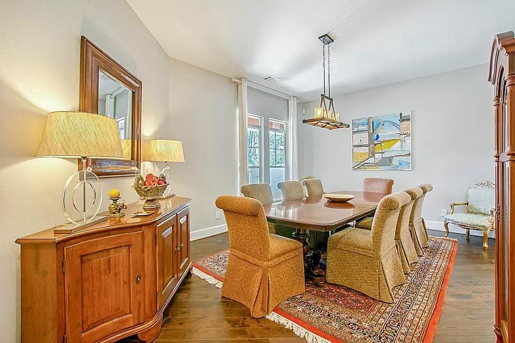 Skirted Dining Chairs and a Pedestal Table Signal Old-School Comfort Done Right