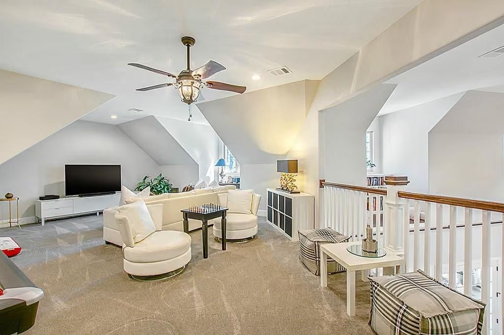 Vaulted Bonus Room Puts a Chess Table Where a TV Usually Wins