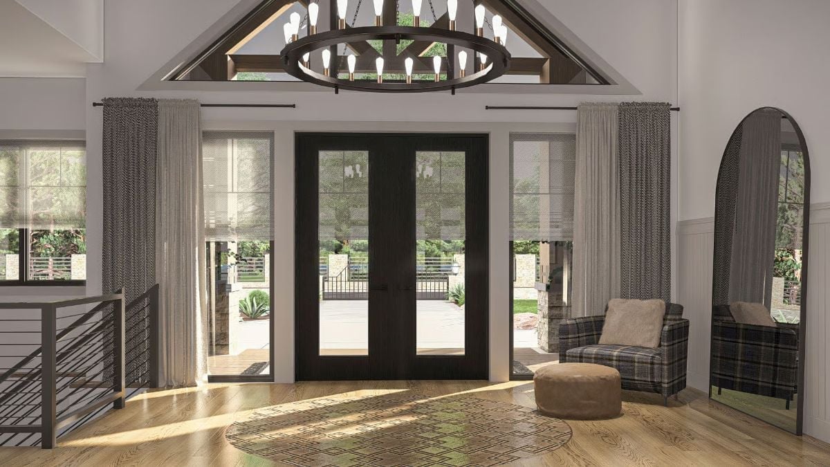 Vaulted Foyer with Plaid Armchair Energy and Zero Apologies