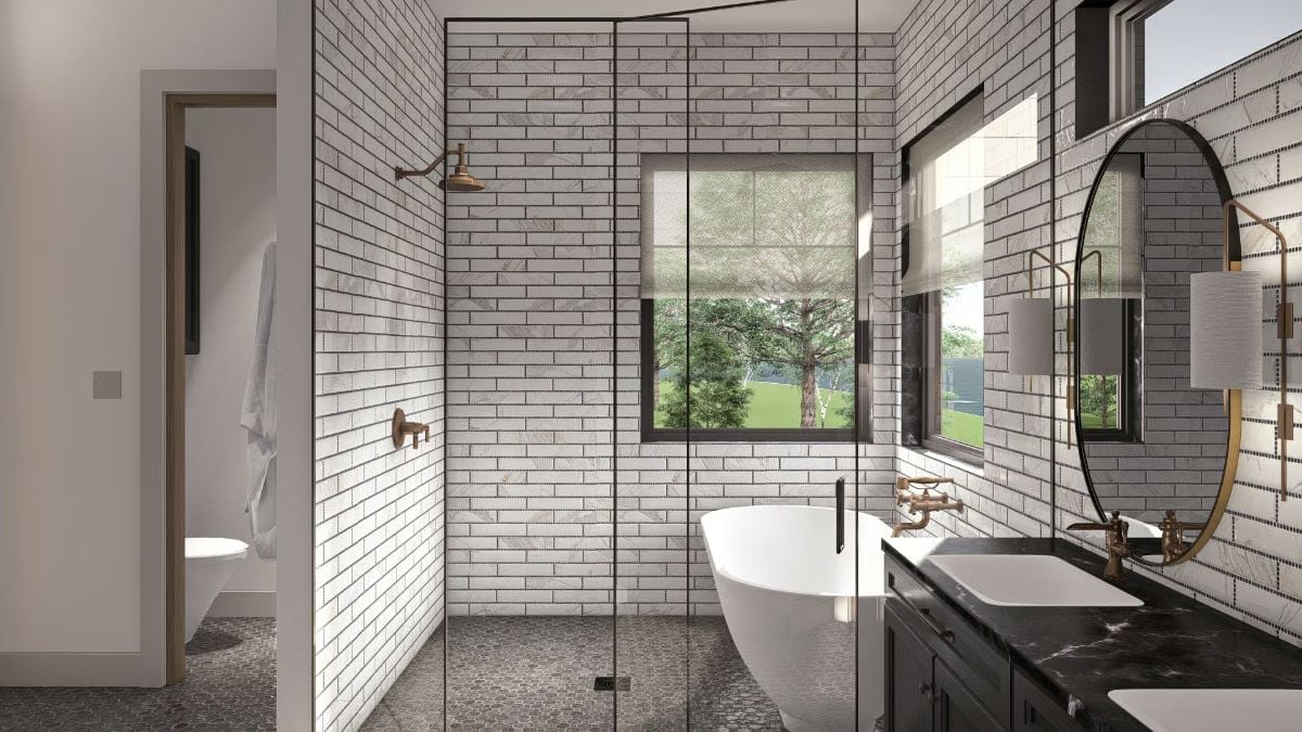 White Subway Tile, Pebble Floors, and a Freestanding Tub Worth the Splurge