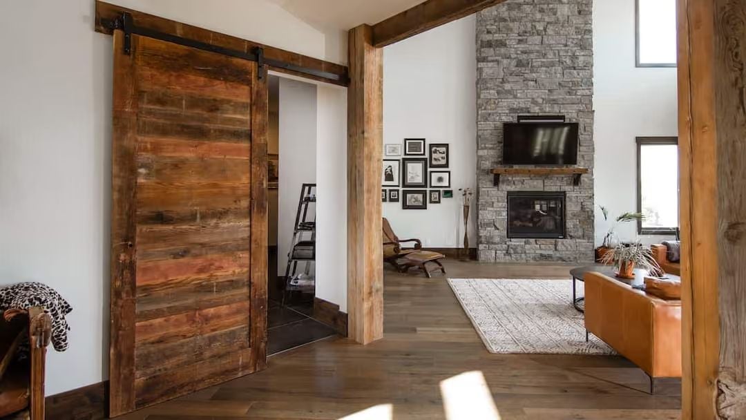 Reclaimed Wood and Stacked Stone Share a Wall Without Fighting for Attention