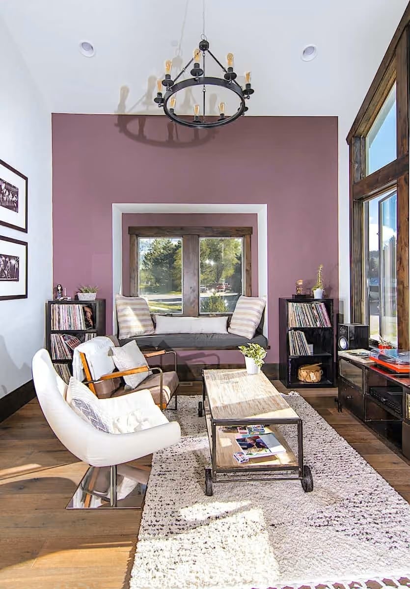 Vinyl Records, a Plum Wall, and a Coffee Table on Wheels Walk Into a Living Room