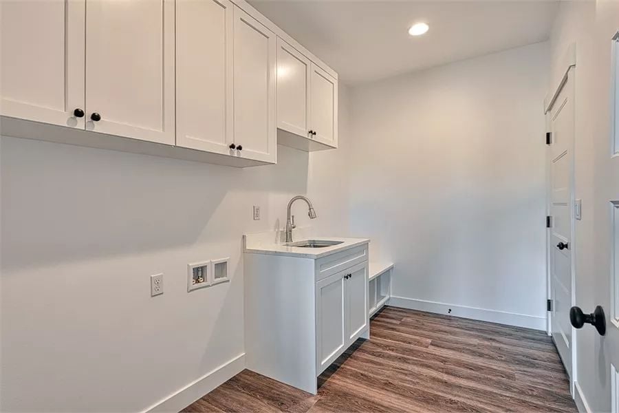 Laundry Room Sink and Upper Cabinets Make This Utility Space Work Harder