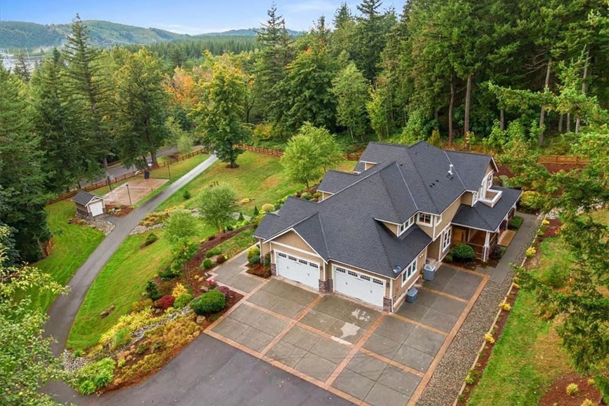 Wooded Acreage With a Four-Car Driveway and Room to Disappear