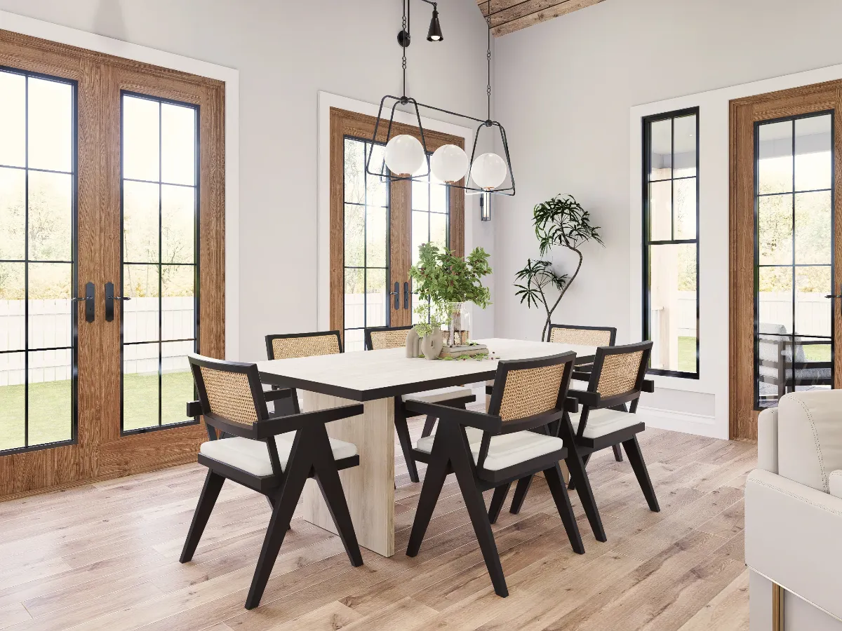 Rattan-Back Chairs and Globe Pendants Set the Tone for This Dining Room