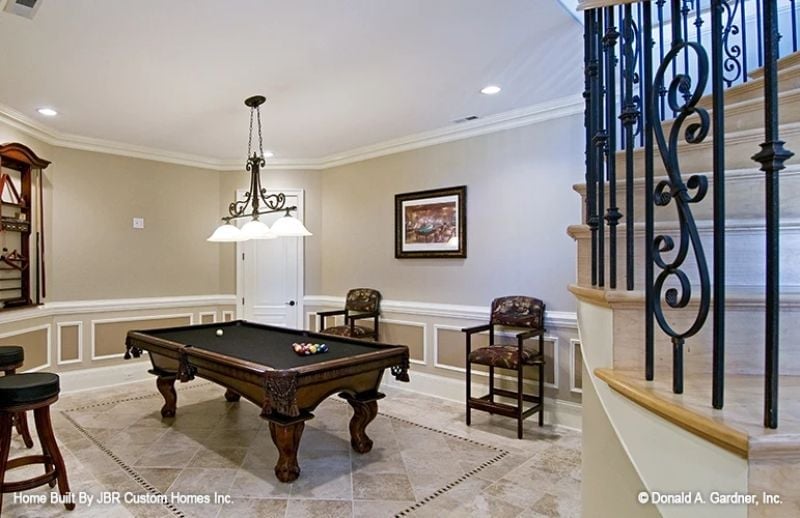 Carved Wood, Iron Balusters, and a Billiard Table That Means Business