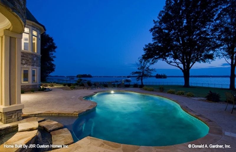 Lit From Below, Open to the Lake: A Pool That Knows Its View