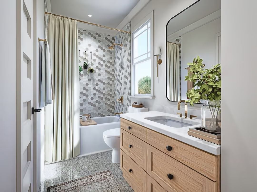 Hexagon Tile and Brass Fixtures Make This Bathroom Feel Like a Considered Choice
