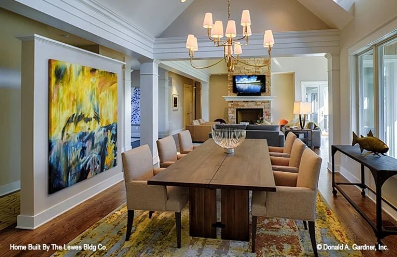 Brass Chandelier, Abstract Canvas, and a Table Built for Ten