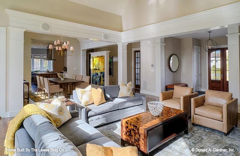Gray Sofas, Gold Pillows, and a Coffee Table That Steals the Room