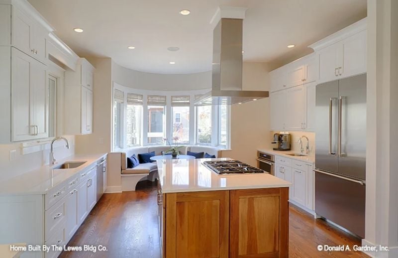 Wraparound Range Hood, Wood Island Base, and a Breakfast Nook That Pulls You In
