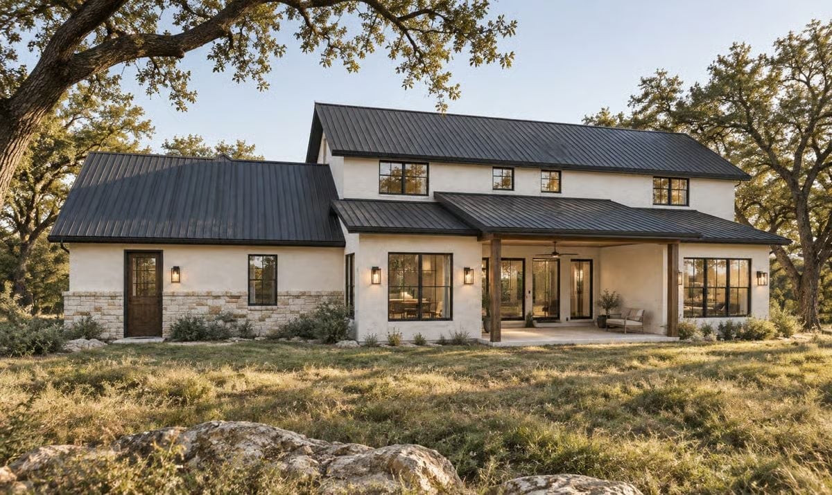 Black Metal Roof, Stone Base, and a Covered Porch Built for Staying Out Late