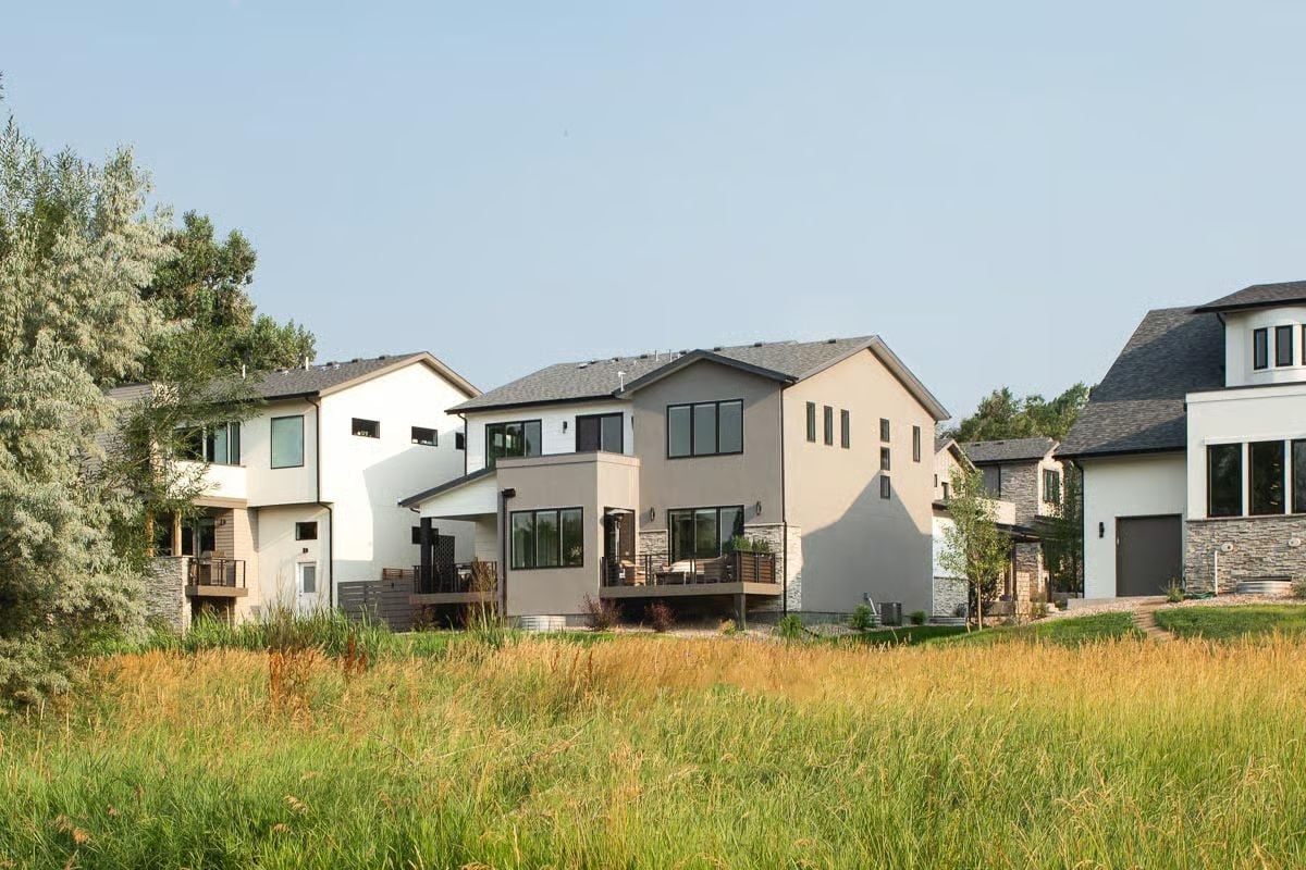 Prairie Grass, Gray Stucco, and a Neighborhood That Hasn't Overbuilt Yet