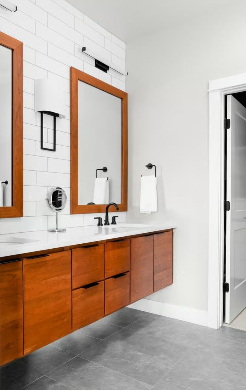 Warm Wood Vanity, Matte Black Hardware, and Subway Tile That Doesn't Try Too Hard