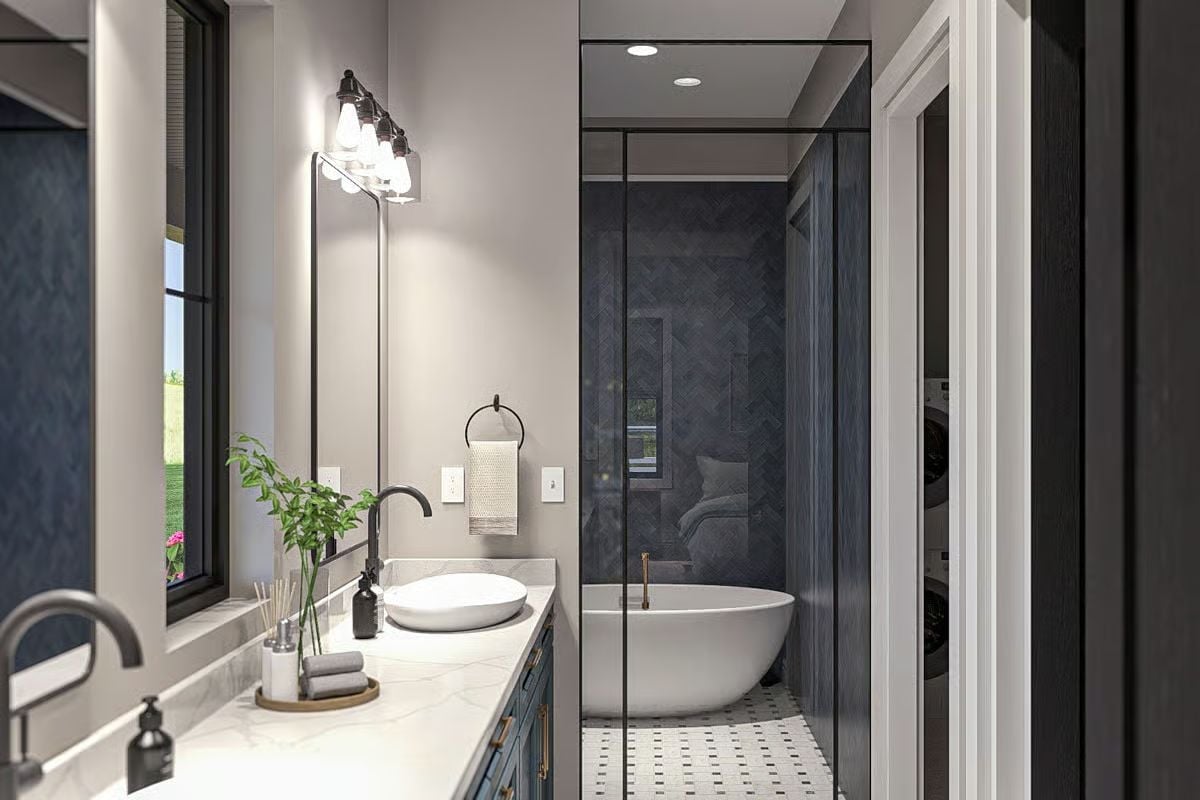 Vessel Sink, Dark Faucet, and Herringbone Tile That Earns Its Moody Reputation
