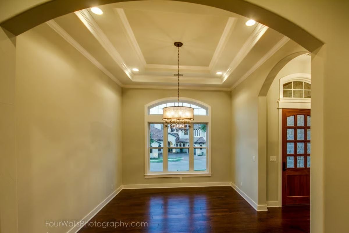 Coffered Ceiling Drama Anchors an Empty Room That's Ready to Become Something