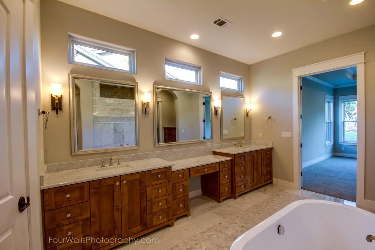 Double Vanity Setup with a Sit-Down Section That Actually Gets Used