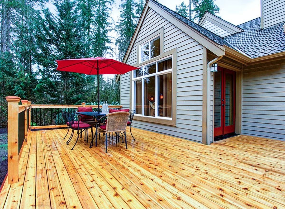 Cedar Decking, Red Umbrella, and French Doors That Pull You Outside