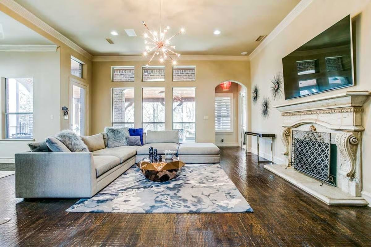 Carved Marble Fireplace and a Coffee Table That Refuses to Be Ignored