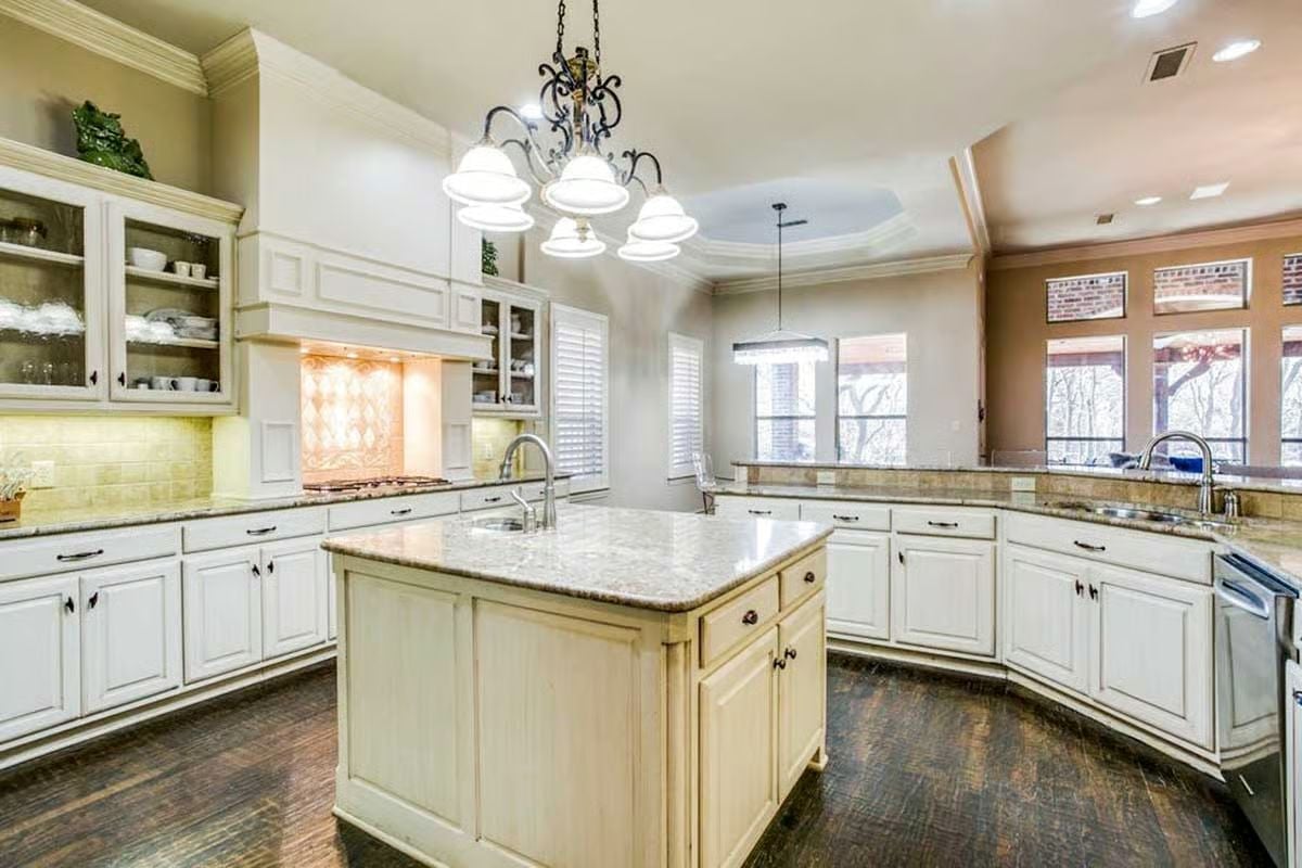 Wrought Iron Chandelier Over a Kitchen Island Built for Real Cooking