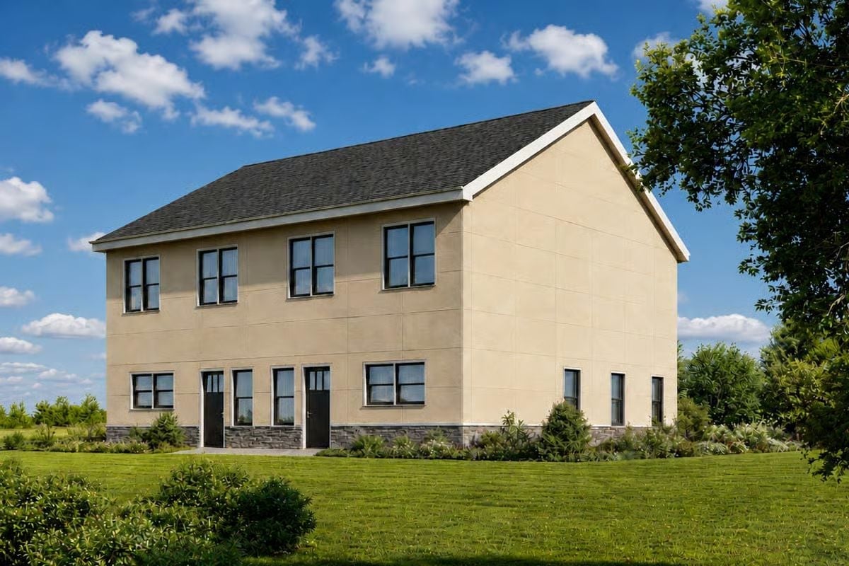 Beige Stucco and Stone Base Give This Duplex a Quietly Confident Street Presence