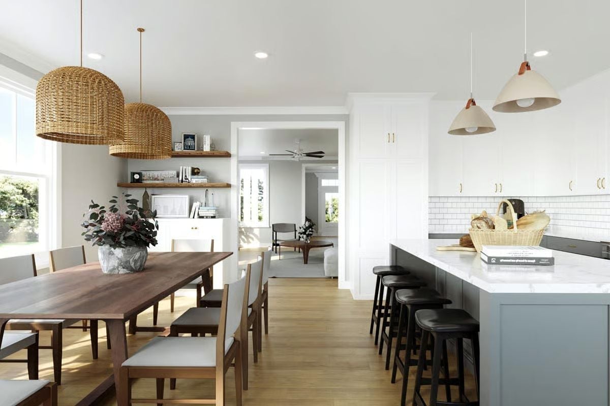 Wicker Pendants and a Walnut Table That Anchor the Whole Open Plan