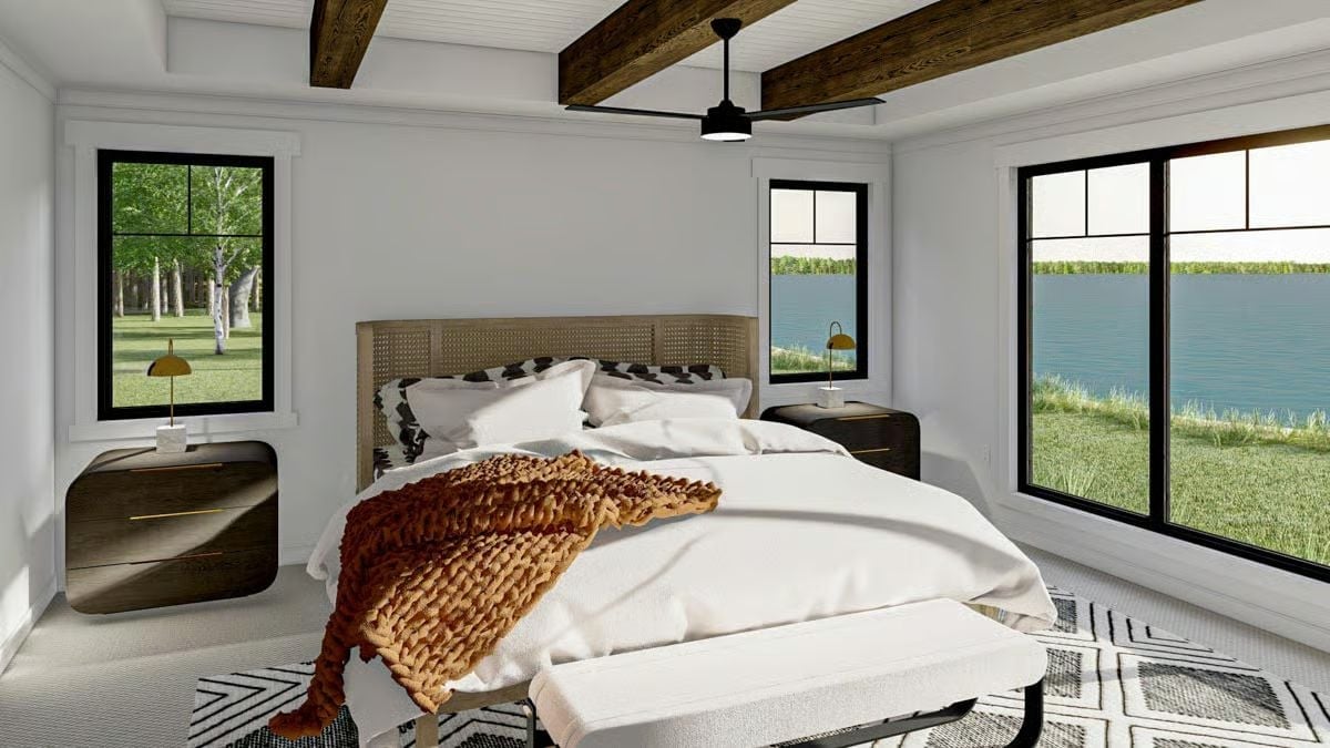 Cane Headboard, Exposed Beams, and a Lake That Fills the Whole Right Wall