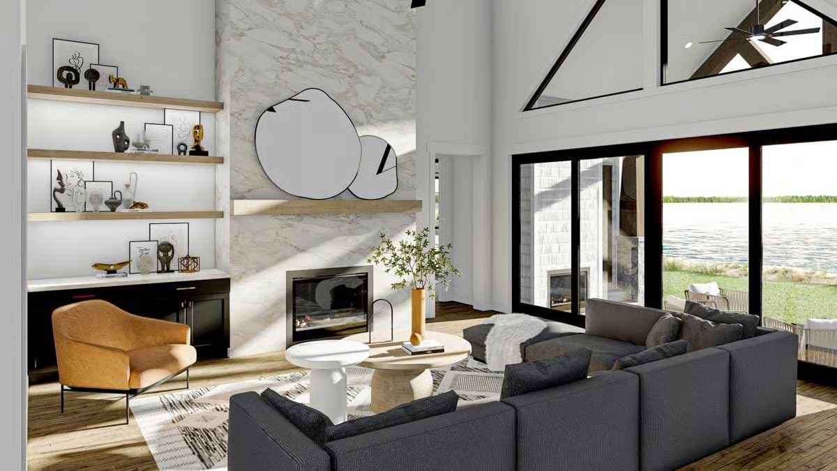 Marble Fireplace Wall, Warm Amber Chair, and a Lake Glittering Through the Glass