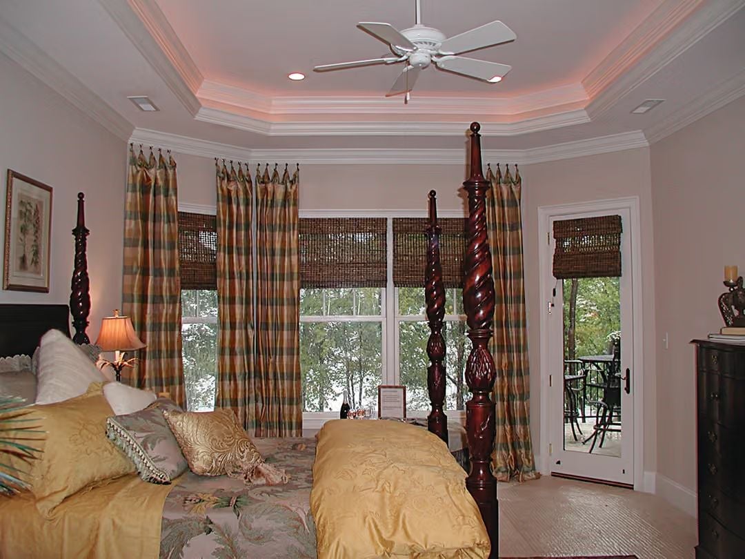 Rope-Carved Poster Bed and a Tray Ceiling That Pulls the Whole Room Together