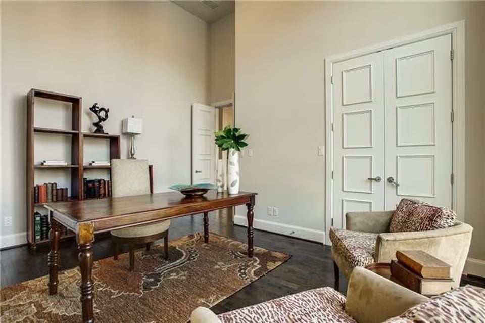 Bookshelf Styling and Animal Print Upholstery Pull This Home Office Away From Generic