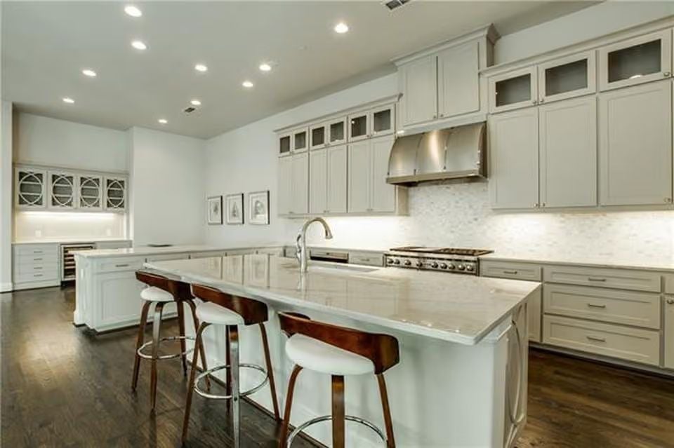 Quartz Island Wide Enough to Seat Three Makes This Kitchen Built for Actual Cooking
