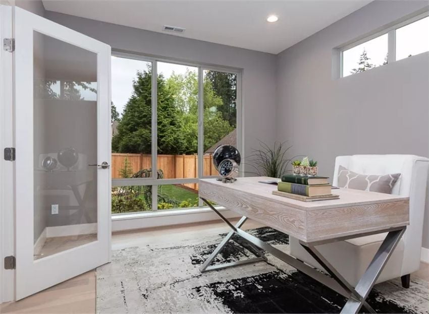 Frosted Glass Doors and Chrome X-Legs Make This Home Office Feel Earned