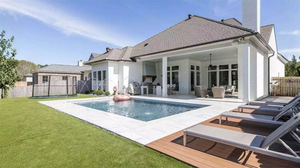 Flamingo Float, Wood Deck, and a Covered Kitchen That Means Business