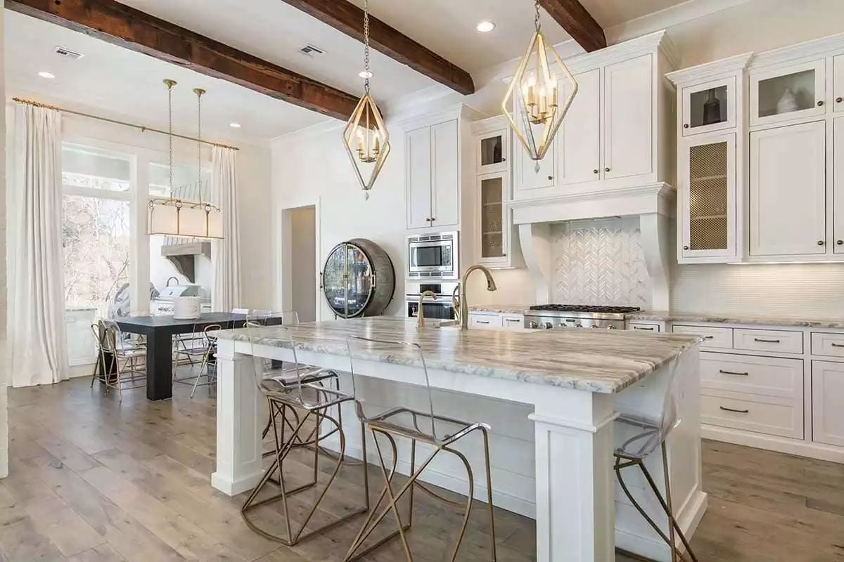 Gold Pendants, Exposed Beams, and an Island Built for Actual Cooking