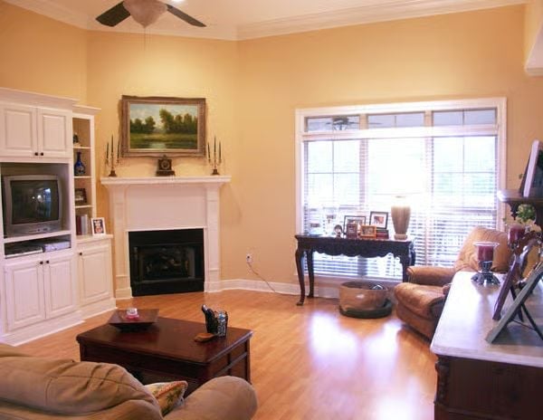 Hardwood Floors, a Corner Fireplace, and Built-Ins That Actually Hold the TV
