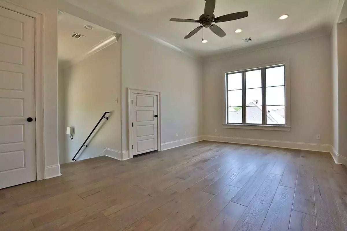 Hardwood Floors and a Ceiling Fan Do More Work Here Than You'd Expect