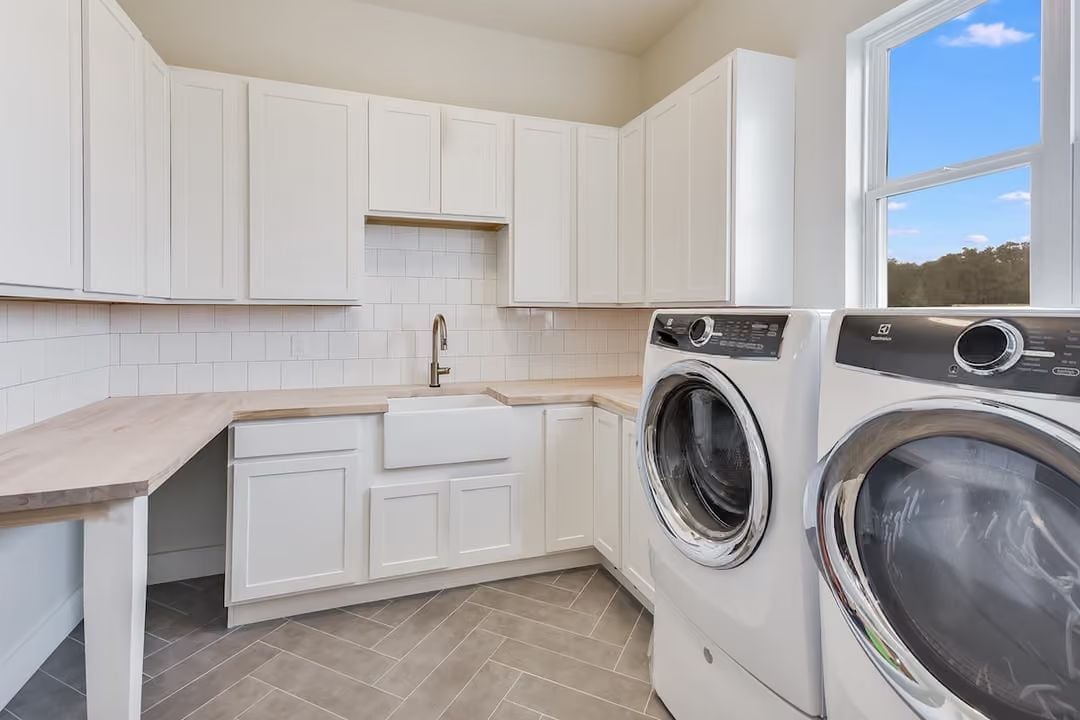 Farmhouse Sink and Butcher Block Keep This Laundry Room Grounded