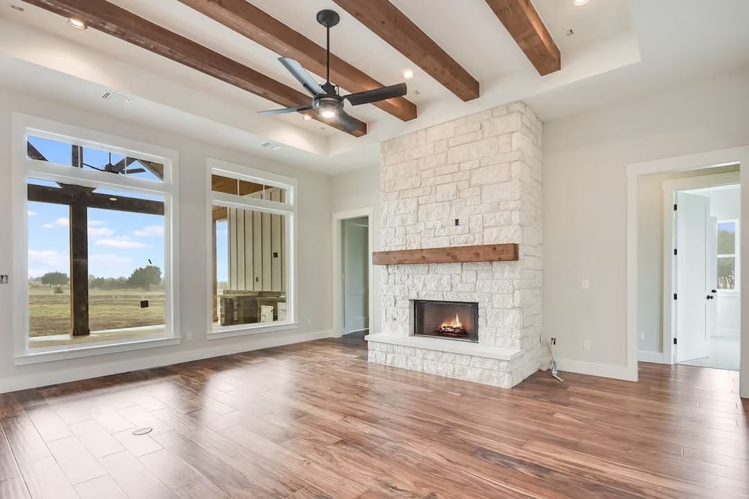 Limestone Surround and Exposed Beams Do the Heavy Lifting Here
