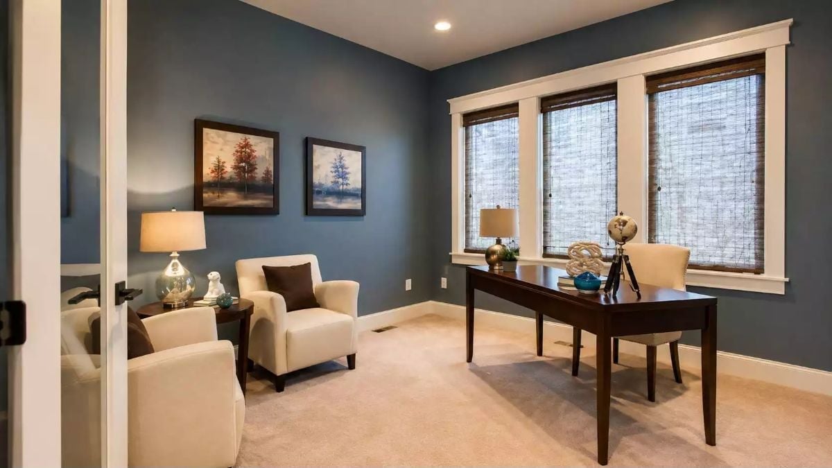 Slate Blue Walls and Bamboo Blinds Give This Home Office a Grounded, Quiet Authority