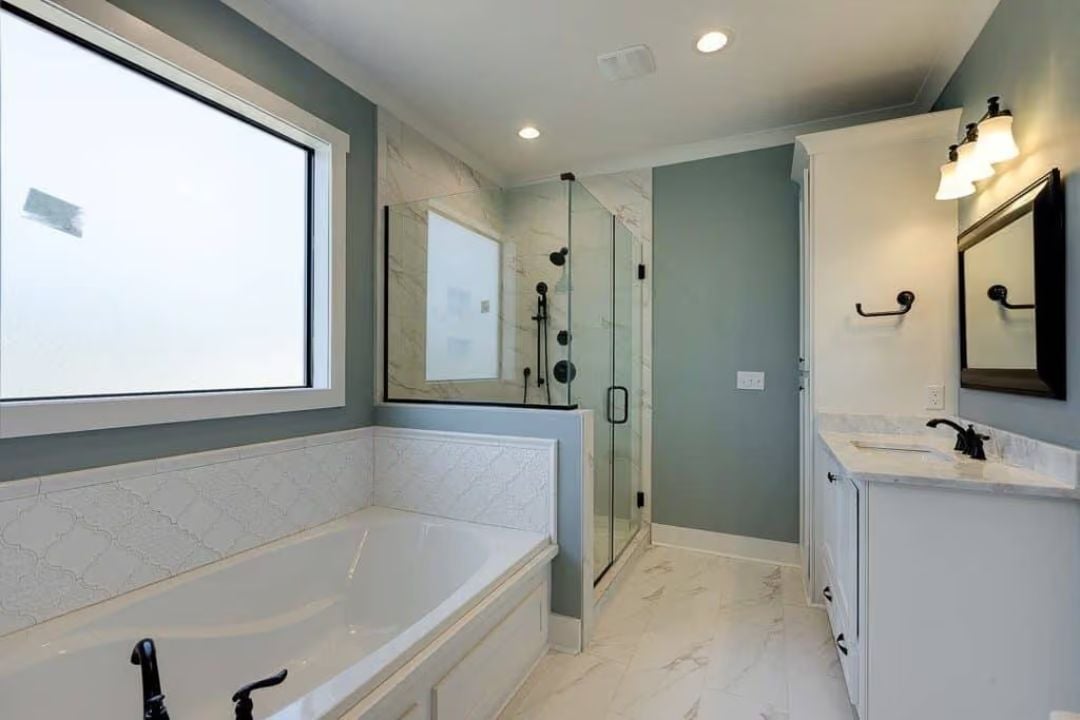 Arabesque Tile Surround and Frameless Glass Where the Spa Comparison Actually Earns Out